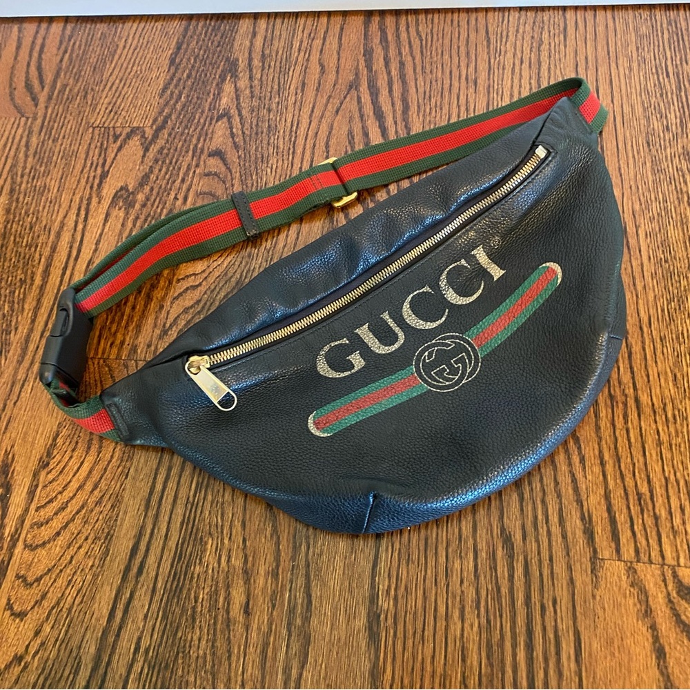 Authentic Gucci Print black leather waist fanny bag